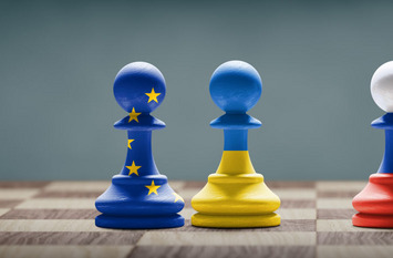 Ukraine, EU and Russia conflict. Country flags on a chess pawns on a chess board
