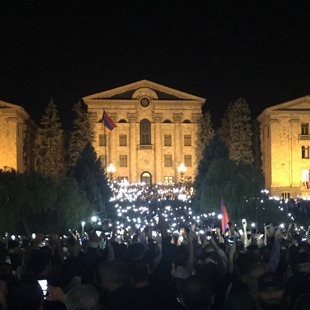 Republic Square in Yerevan at night with brightly illuminated building