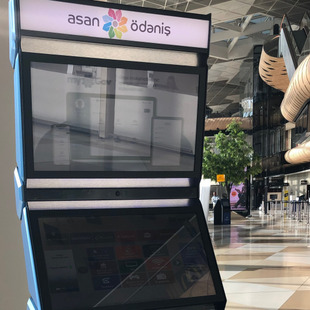 ASAN machine for cashless payments in the airport building of Baku, Azerbaijan, December 2019.