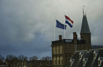 Flags fly over the Den Haag Parliament