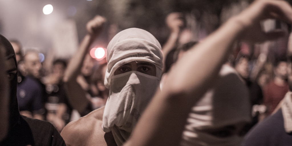 masked demonstrator