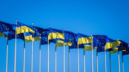 Flags of Ukraine and the European Union wave in the wind