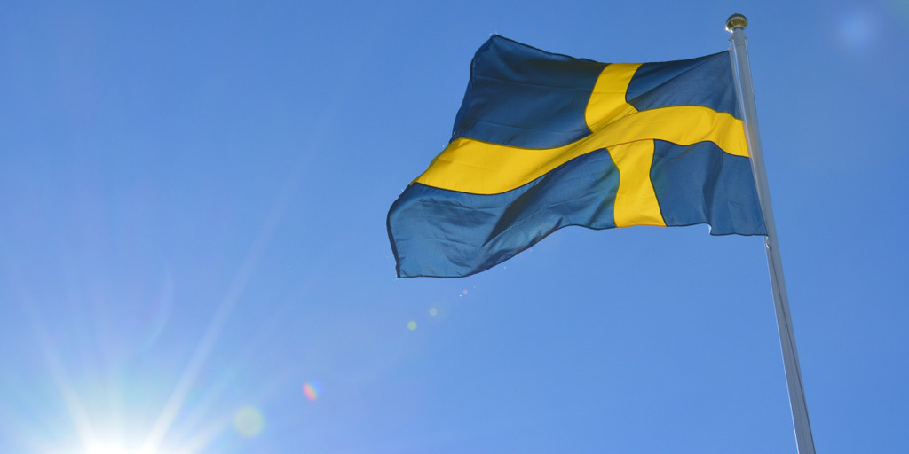banner of sweden in front of the blue sky